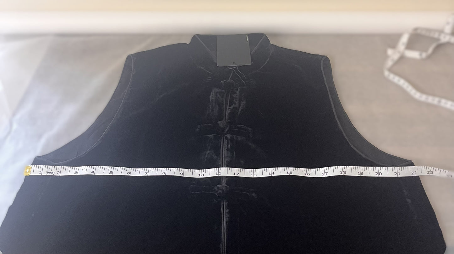 Woman's black Velvet Gilet with traditional knot fastening.