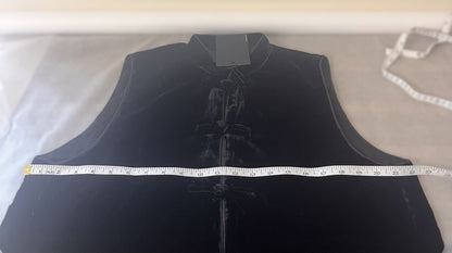 Woman's black Velvet Gilet with traditional knot fastening.